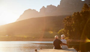 Senior couple by a lake.